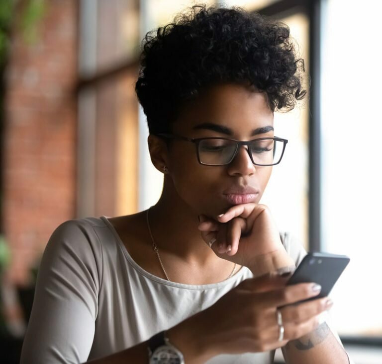 Young woman viewing patient portal on phone